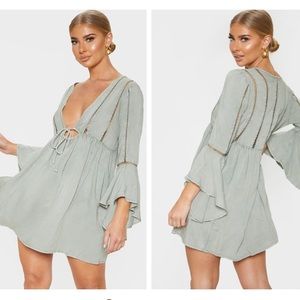Pale khaki tie front frill long sleeve beach dress